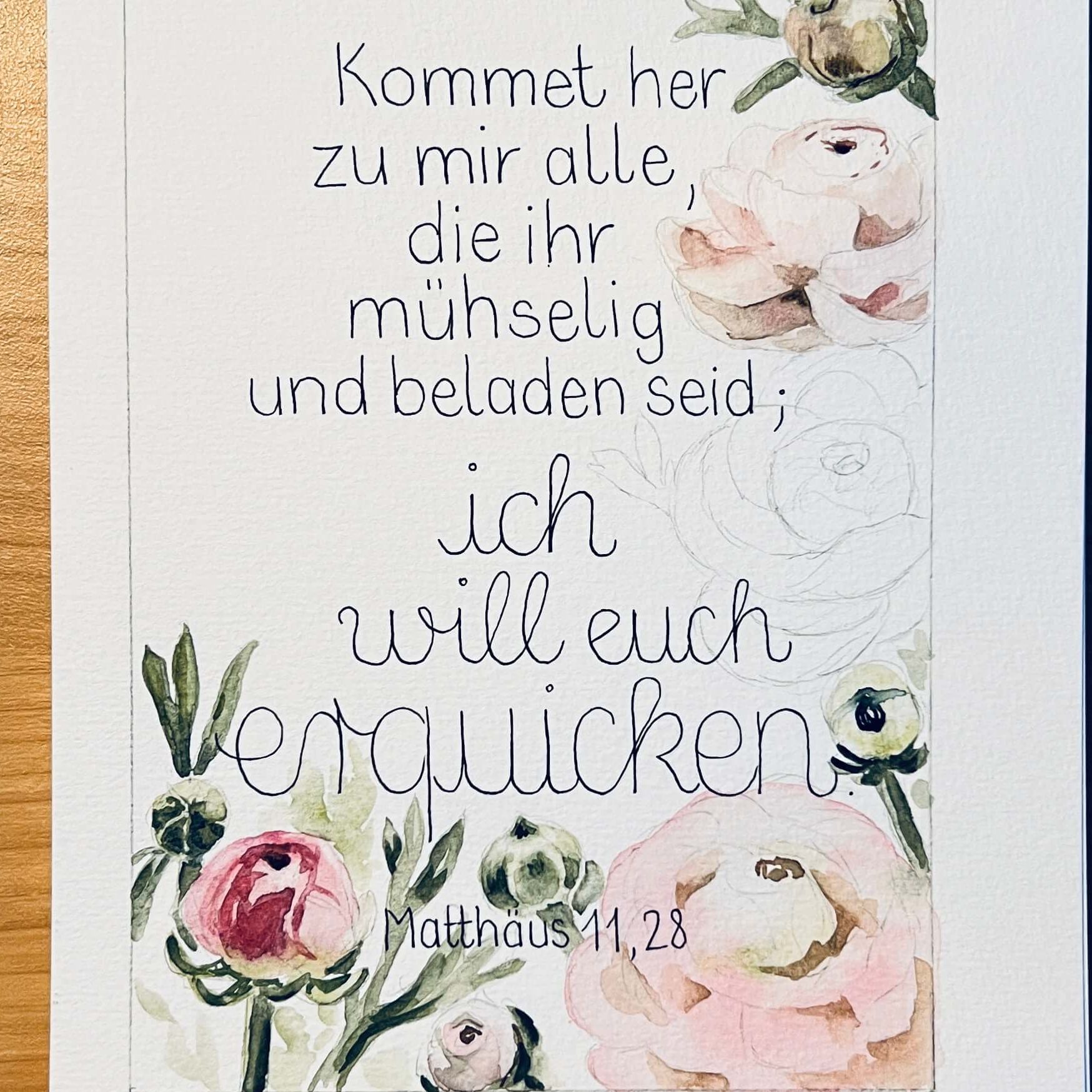 Ranunkeln schmücken den Bibelvers