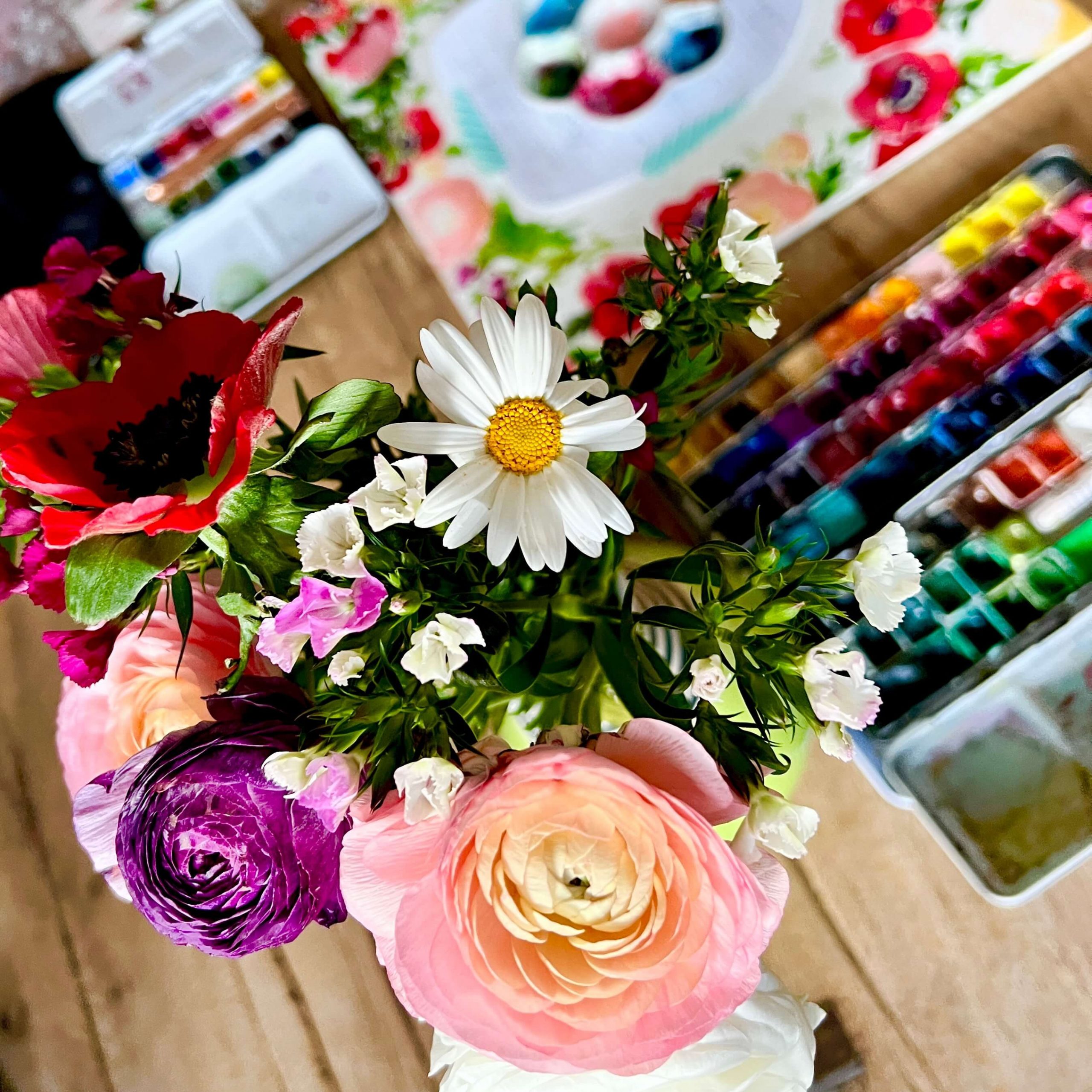 Ranunkeln und Margeriten